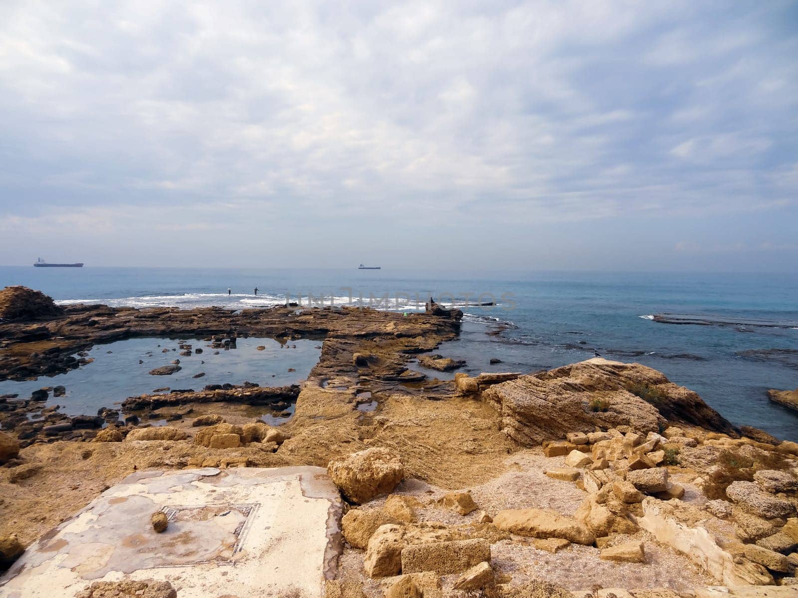 Rocky coast near the ancient Caesarea national park on the Mediterranean coastline, Israel. High quality photo