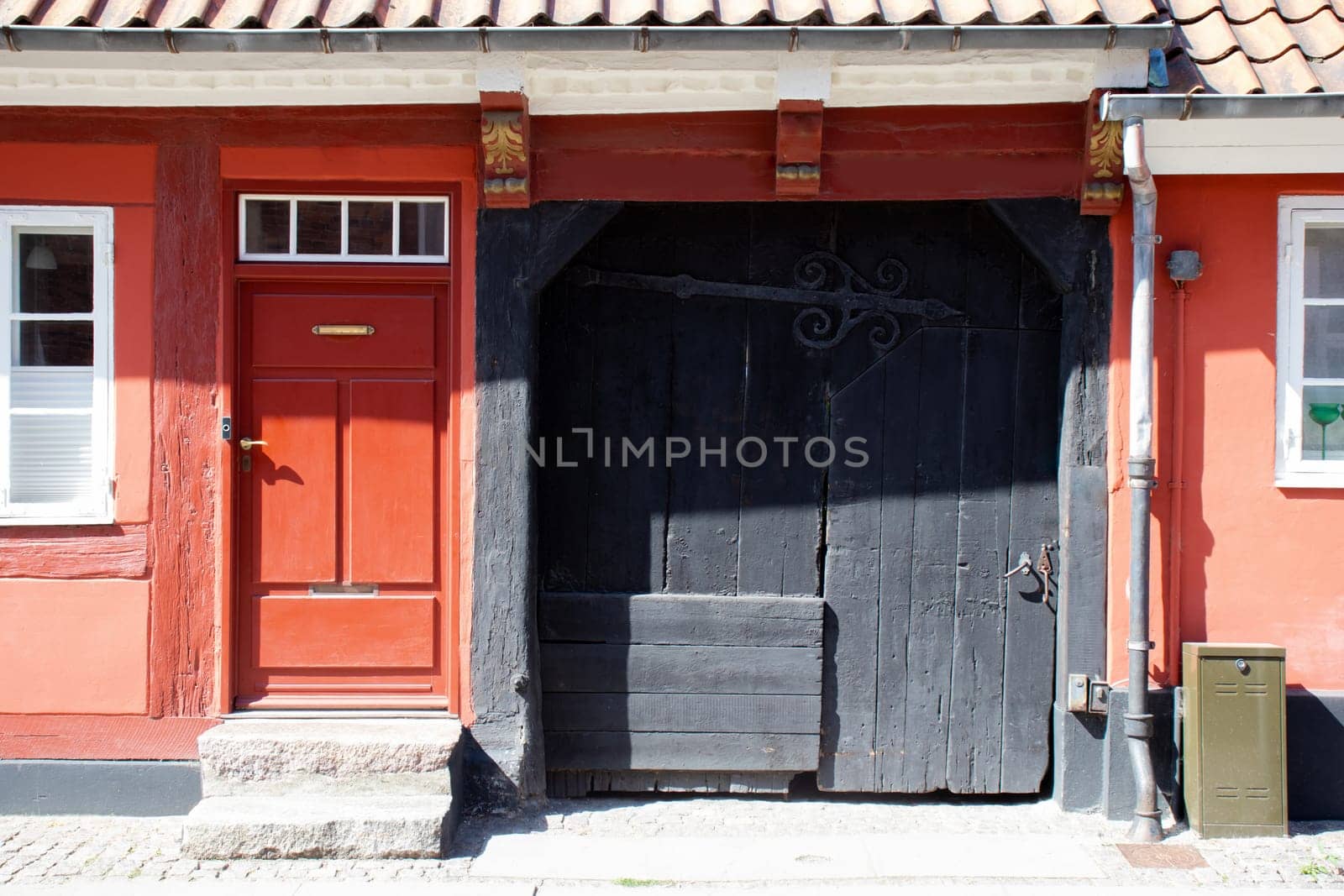Colorful old historic house in a street of Koge City. Traditional Scandinavian houses.