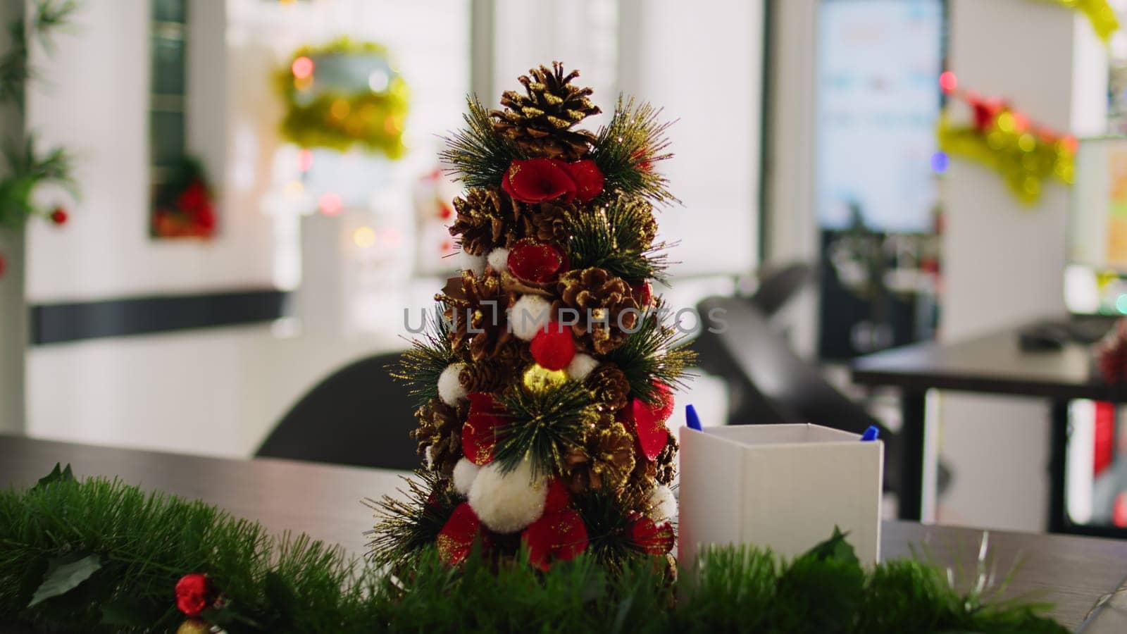 Mini Christmas pine tree in office by DCStudio