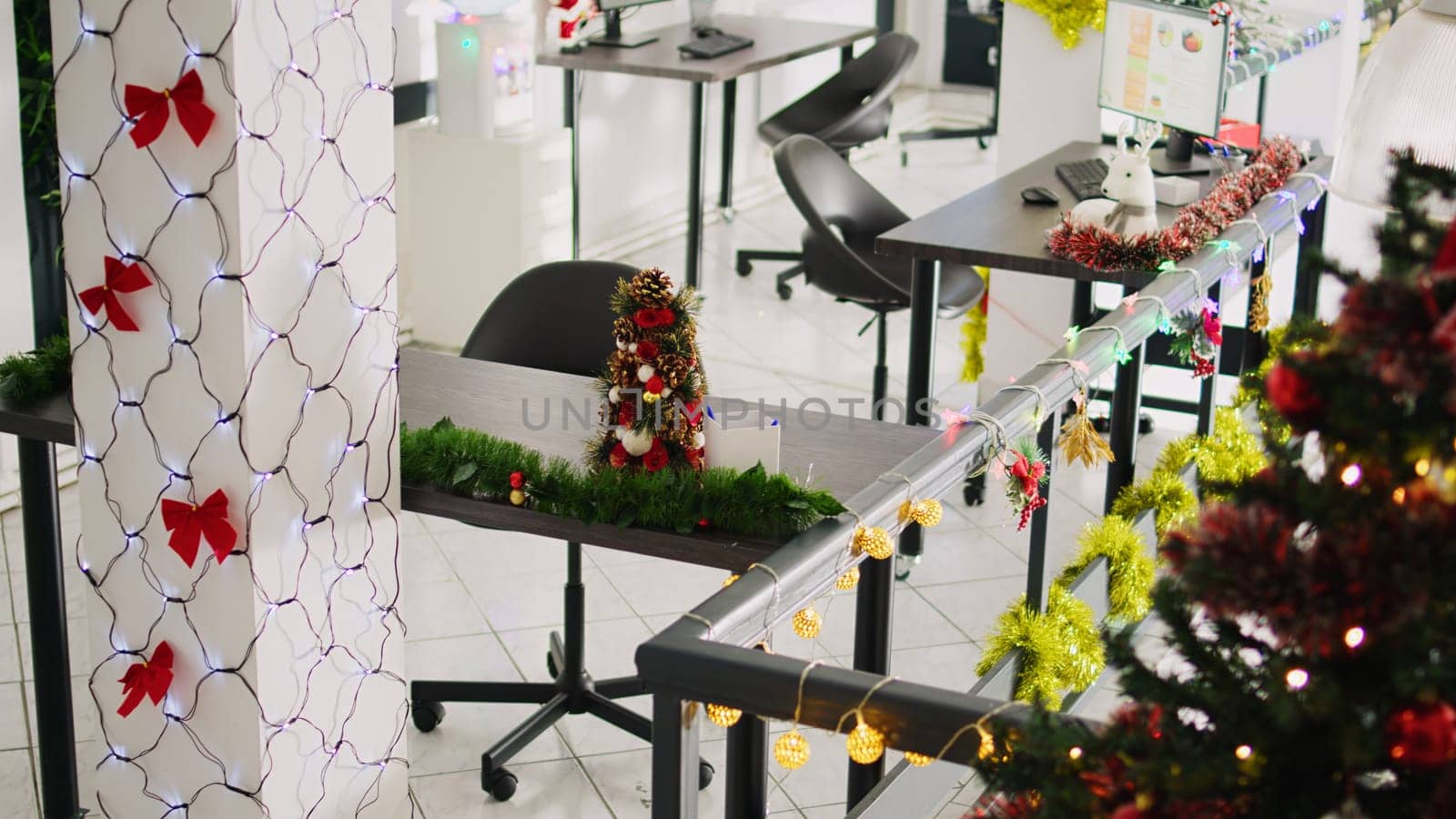 Zoom in on Christmas tree in office by DCStudio