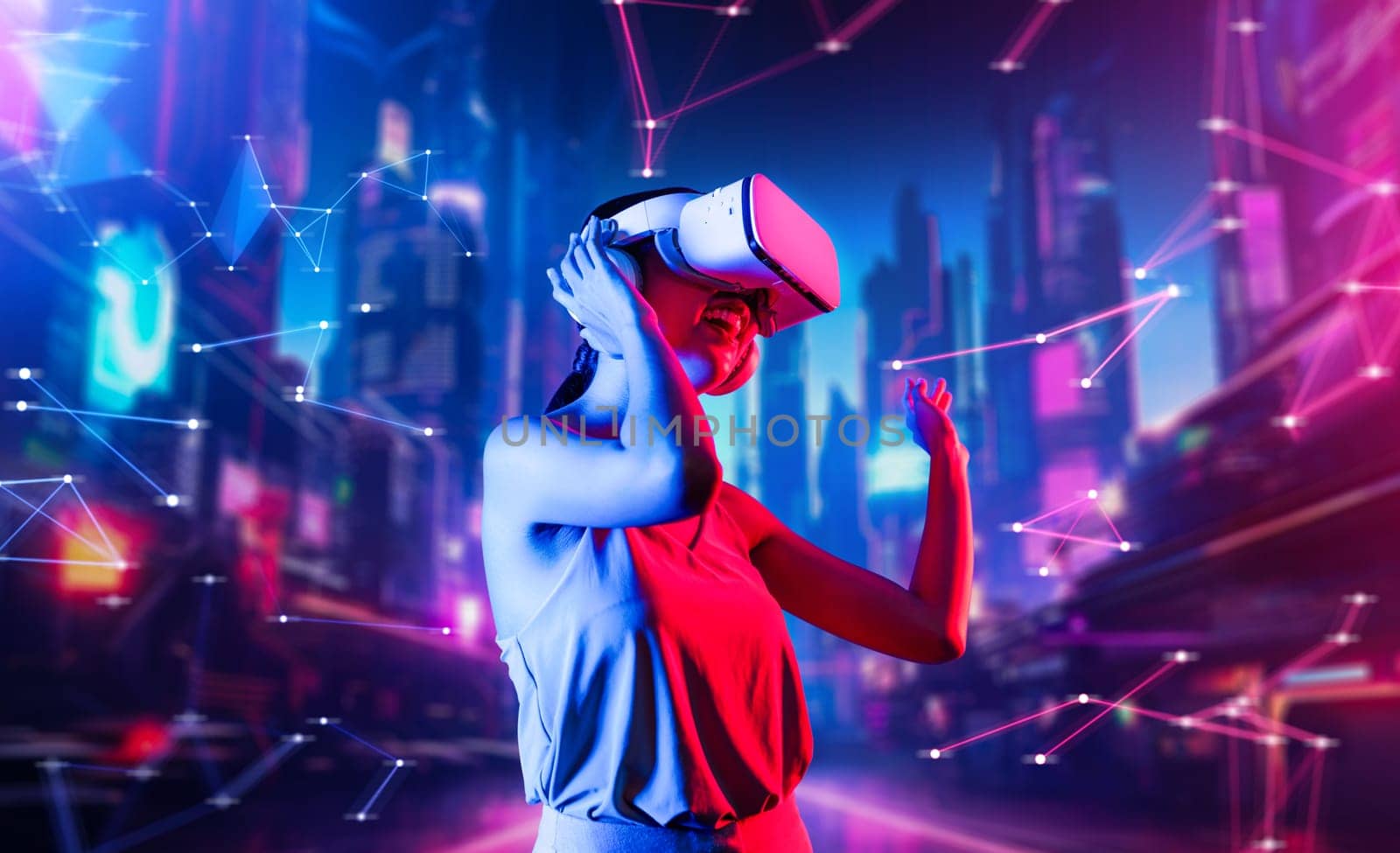 Female standing in virtual reality cyberpunk style building wear VR headset connecting metaverse, future cyberspace community technology, Woman dancing raising one arm holding goggle. Hallucination.