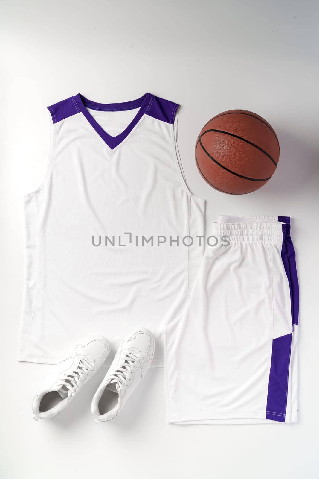 Basketball uniform on white background top view by Fabrikasimf