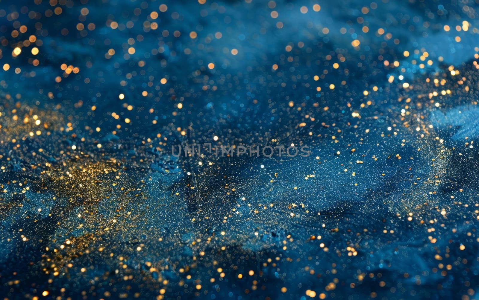 An abstract textured pattern with deep cosmic blue hues sprinkled with glints of gold, evoking the infinite depth of a star-studded galaxy