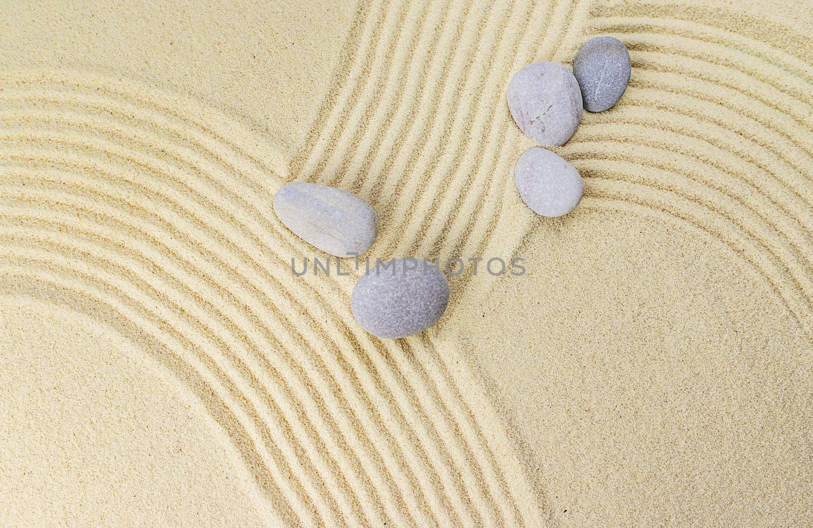 Background with stones on the sand. Selective focus. Spa.