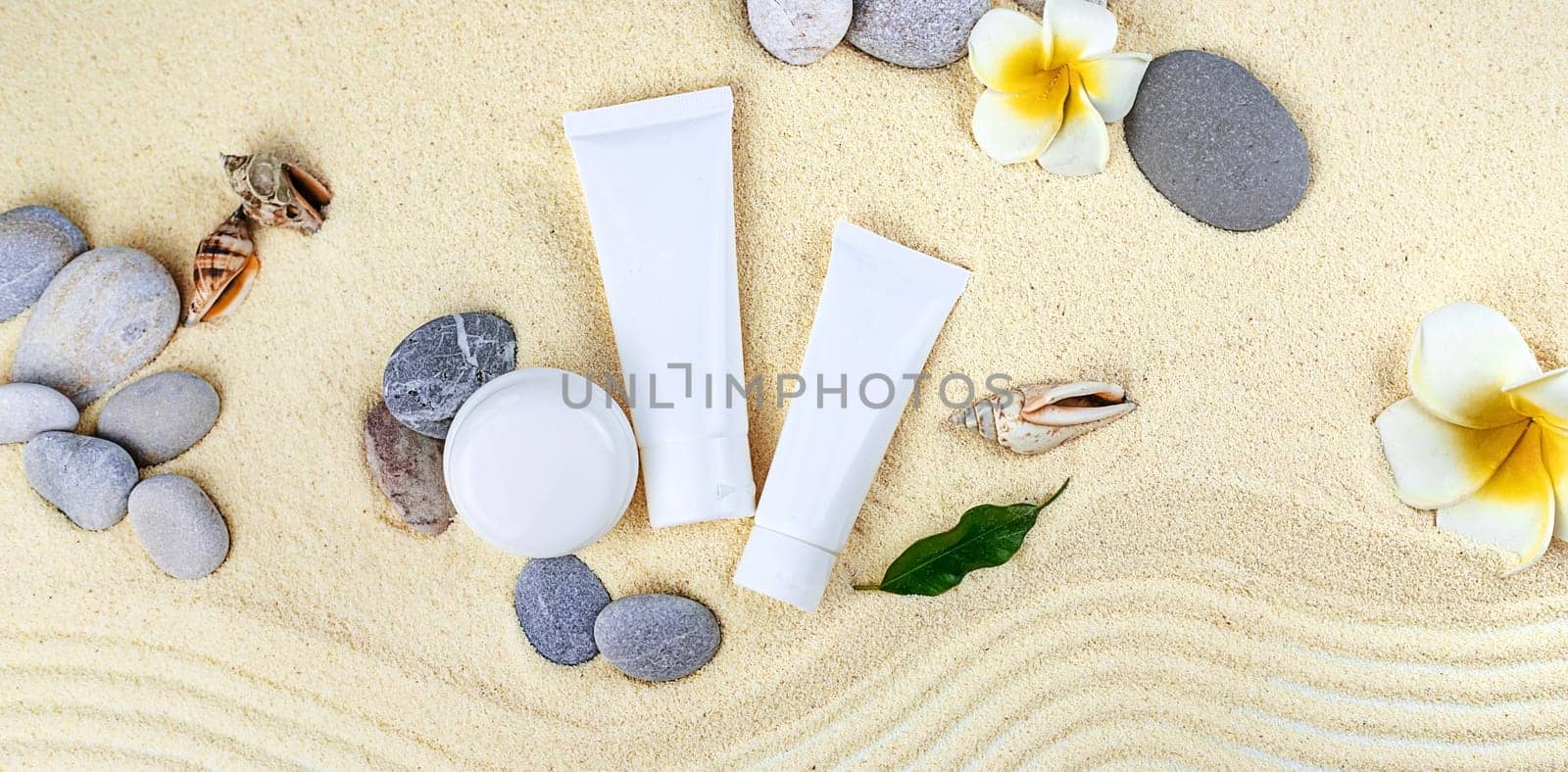 Cosmetics on the spa sea sand. Selective focus. Nature.