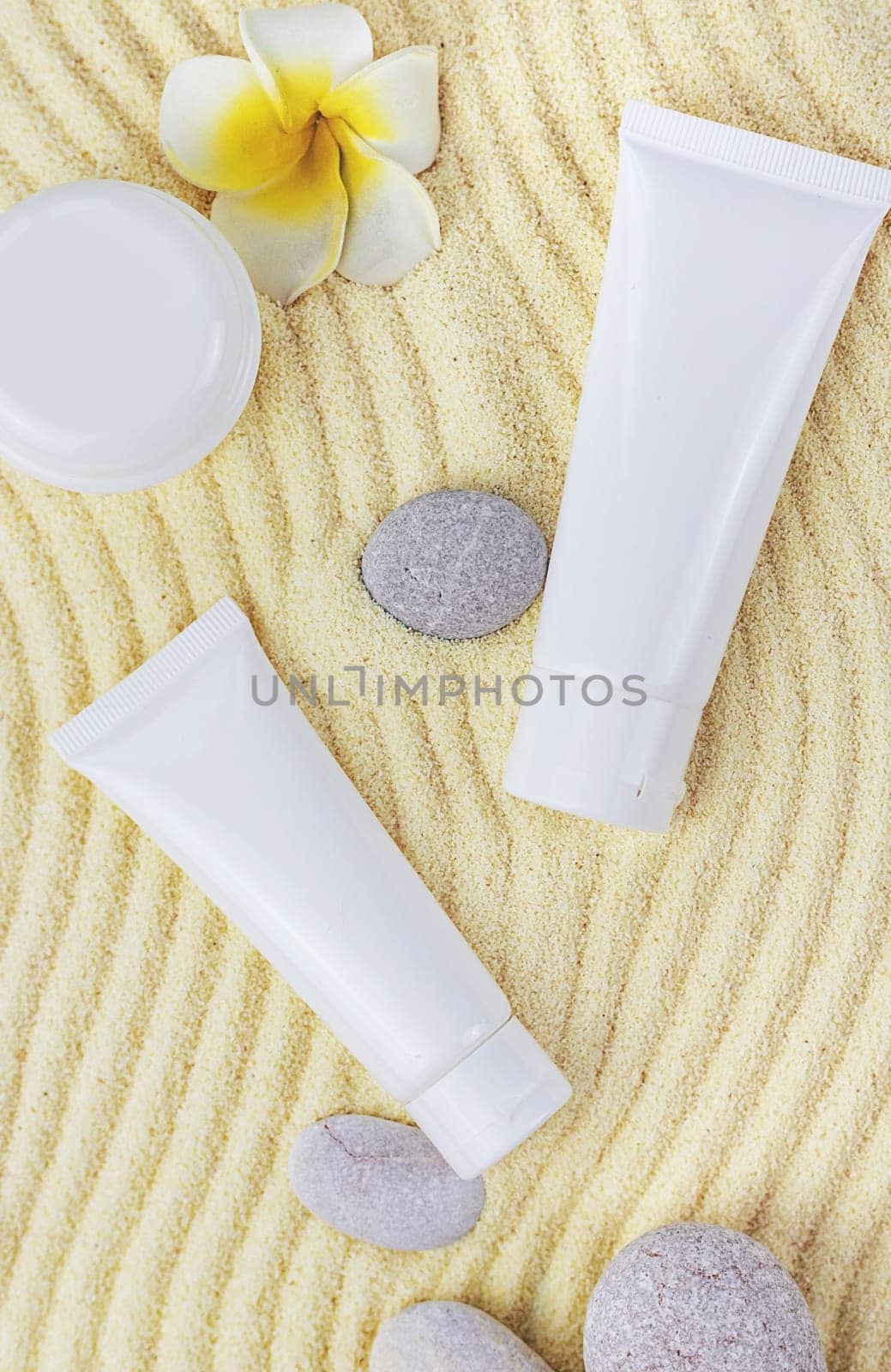 Cosmetics on the spa sea sand. Selective focus. Nature.