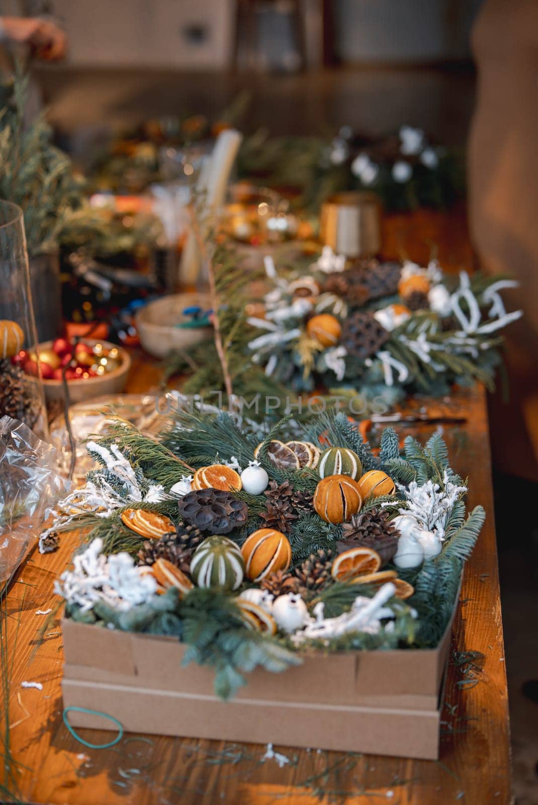 DIY session for creating Christmas wreaths and New Year's ornaments. High quality photo