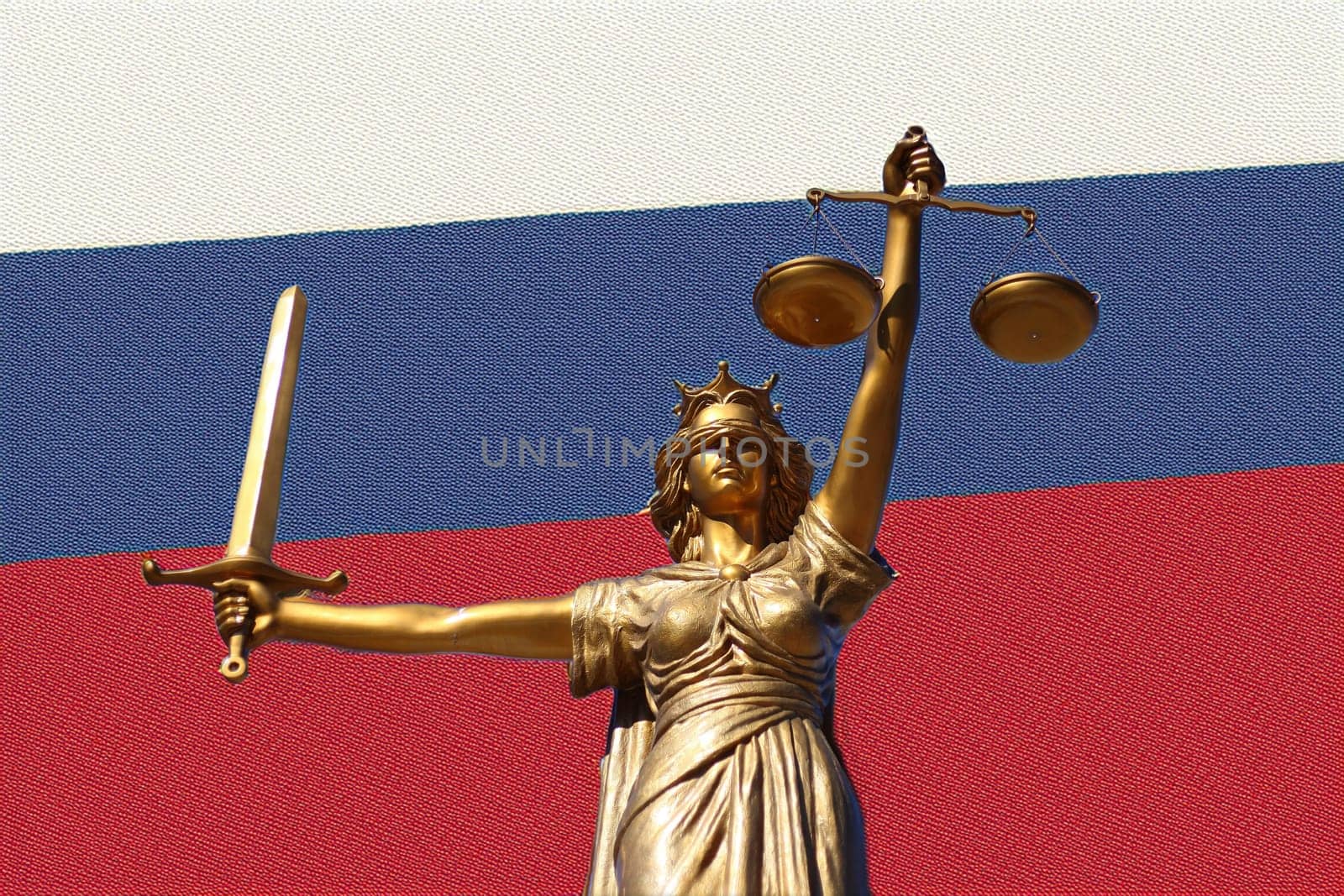 Scales of Justice, Lady Justice, Lady Justice in front of the Russian flag in the background.