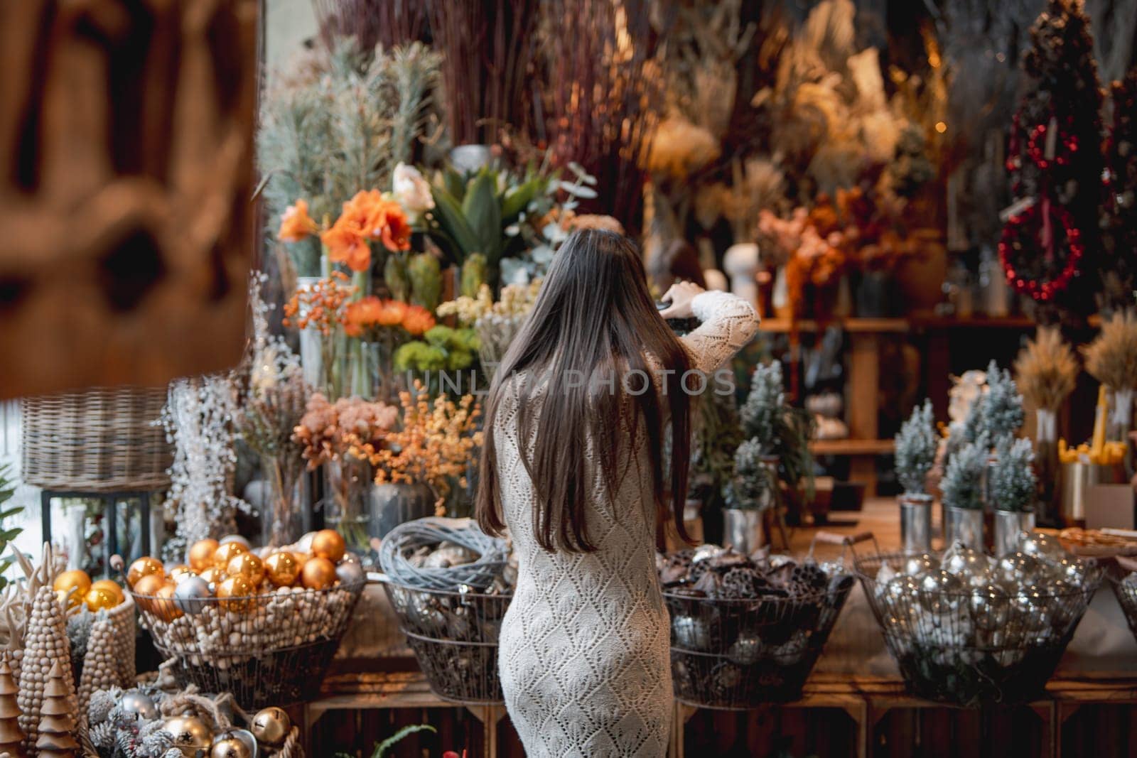 Exquisite New Year's decor arranged tastefully on the store countertop. High quality photo