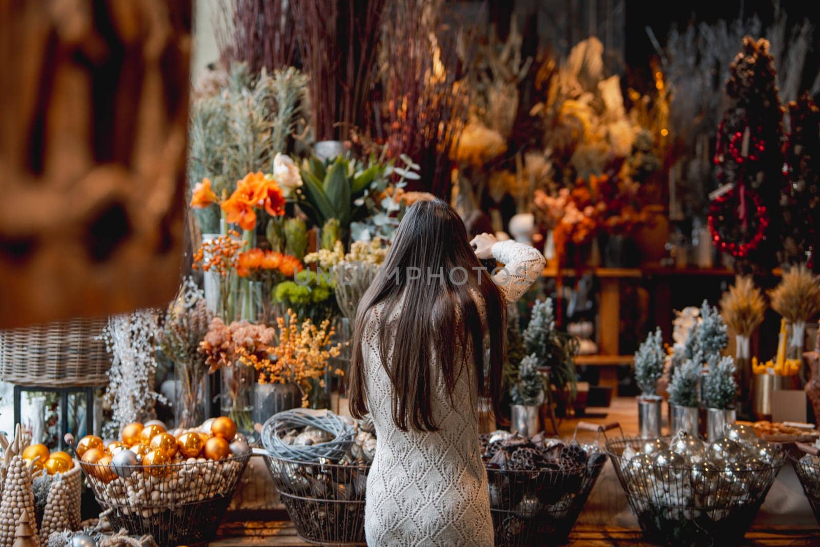 Charming holiday ornaments embellishing the shop counter. High quality photo