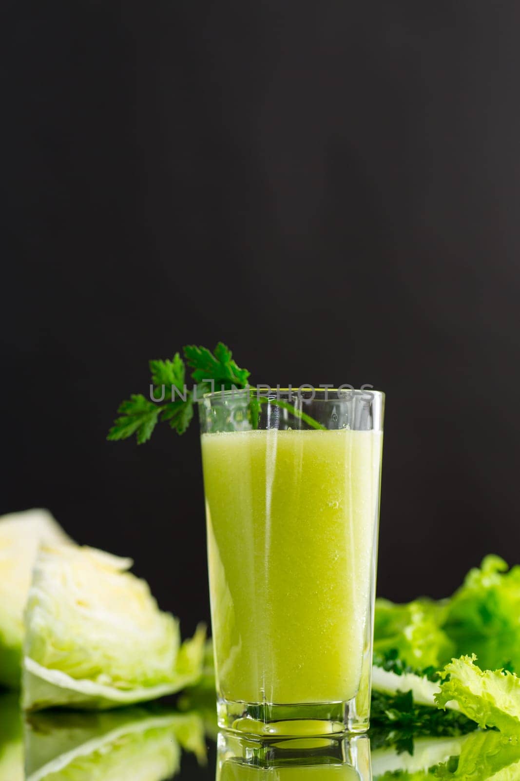 vegetarian smoothie made from green vegetables, cabbage, lettuce, greens .