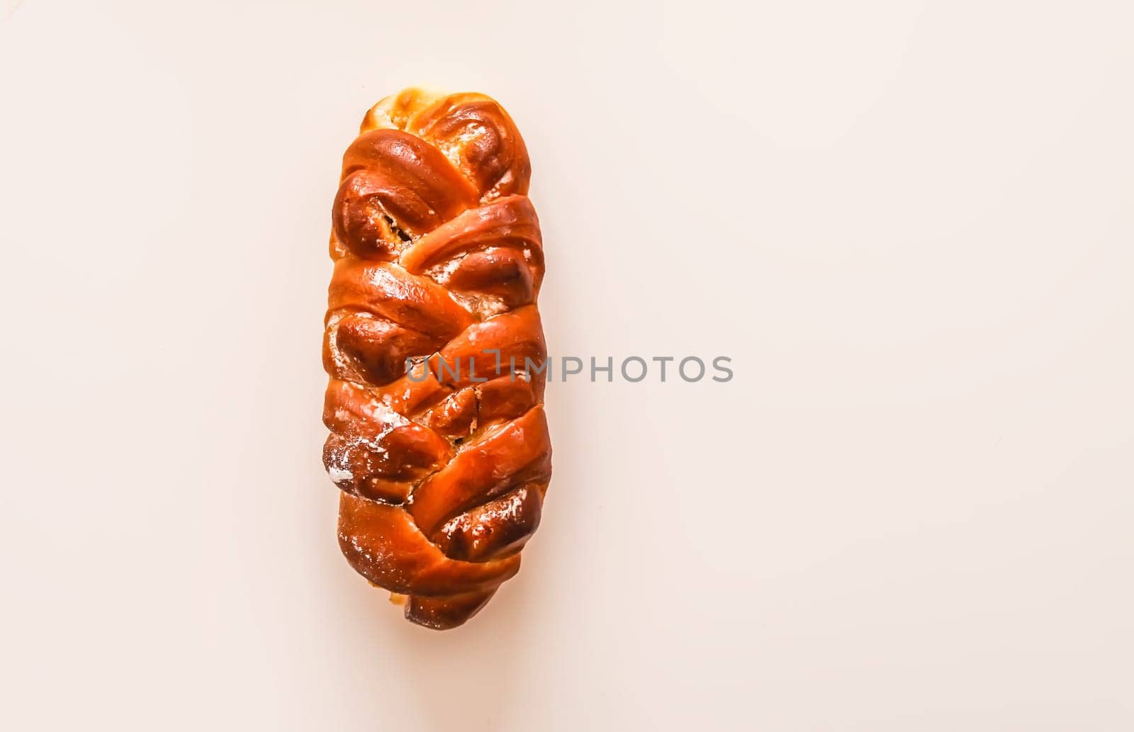 Freshly baked sweet buns. Homemade pastry on white background.