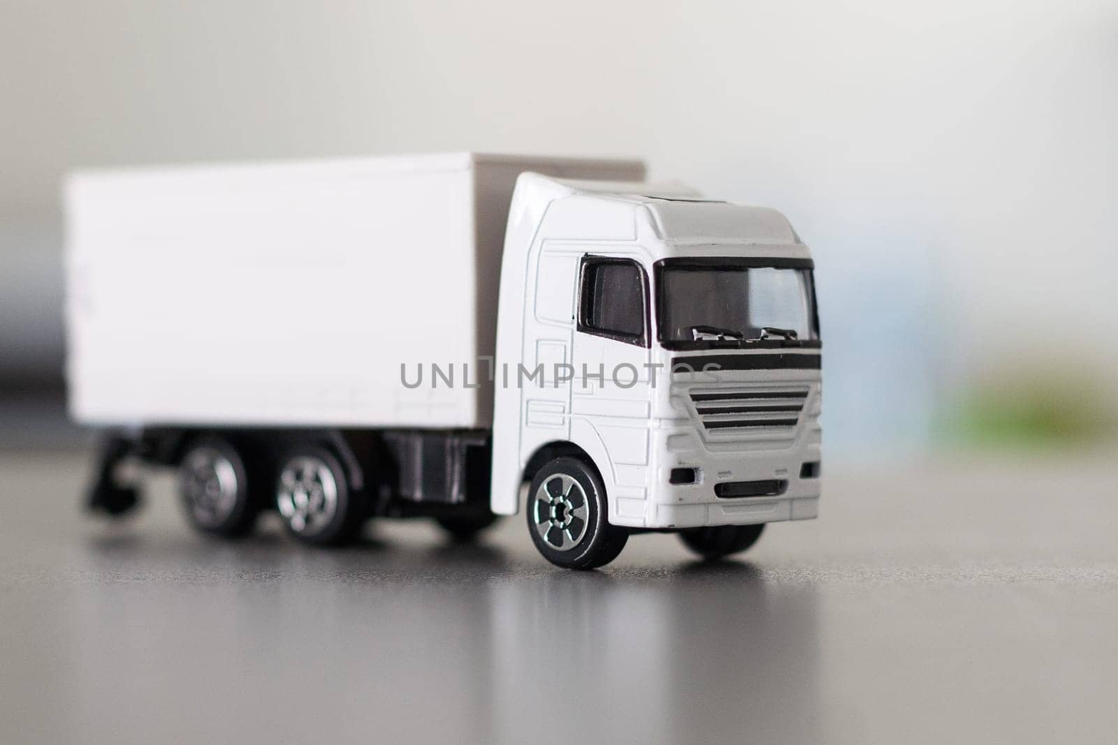 White delivery truck on white background by Andelov13