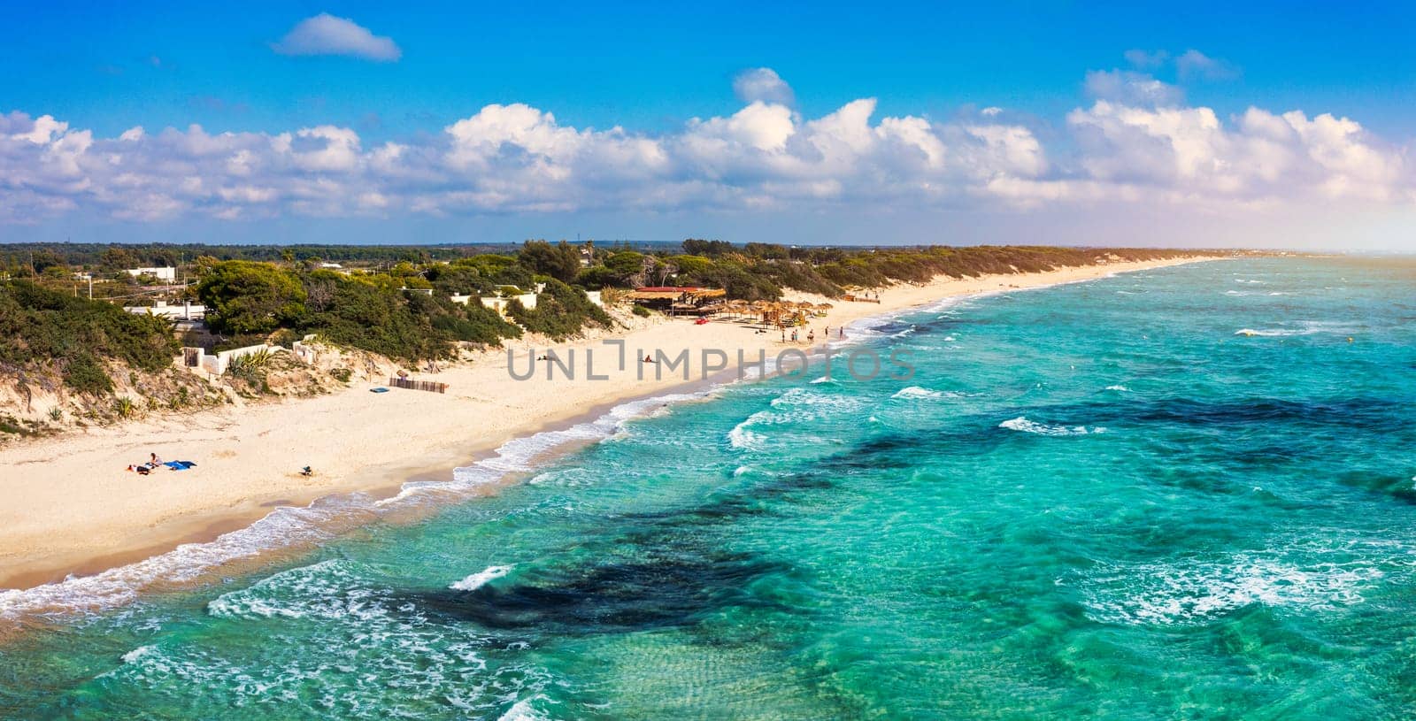 Punta Prosciutto is a wonderful beach of Salento coast, part of the Municipality of Porto Cesareo, Puglia region, South Italy. Punta Prosciutto in Apulia, one of the most beautiful beaches of Italy.