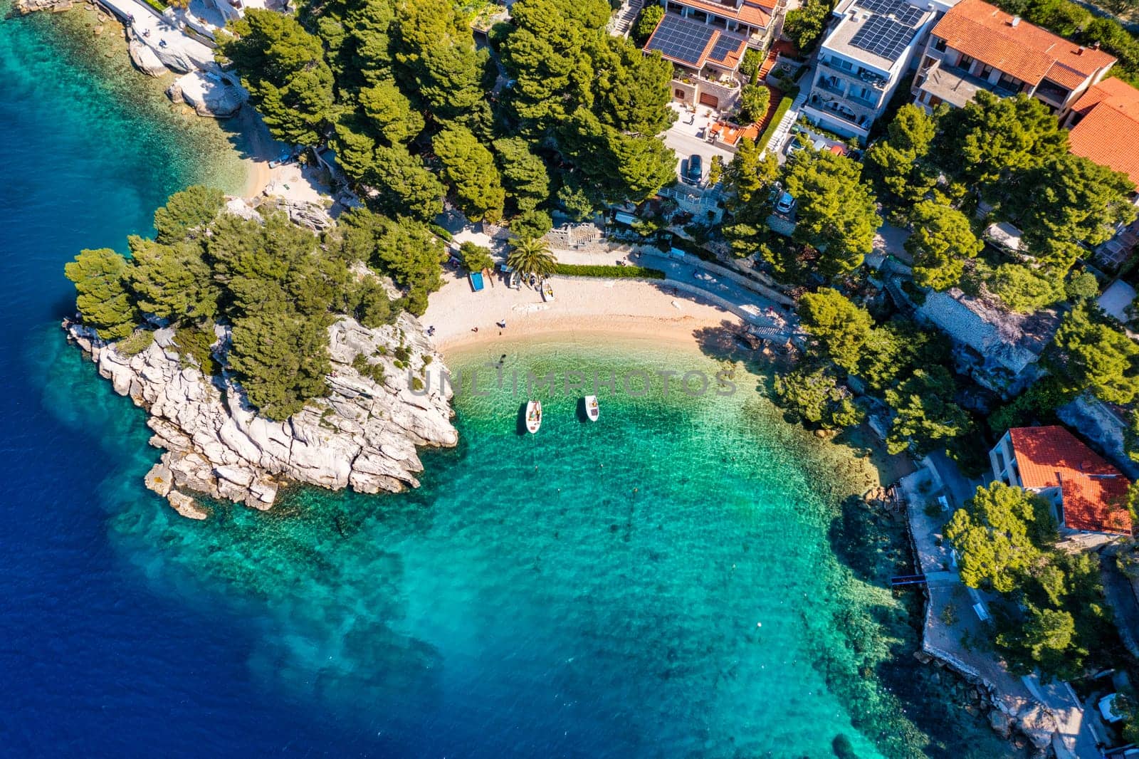 Amazing aerial view of the beautiful Podrace beach in Brela, Makarska Riviera, Croatia. Aerial view of Podrace beach and waterfront on Makarska riviera, Brela, Dalmatia region of Croatia.