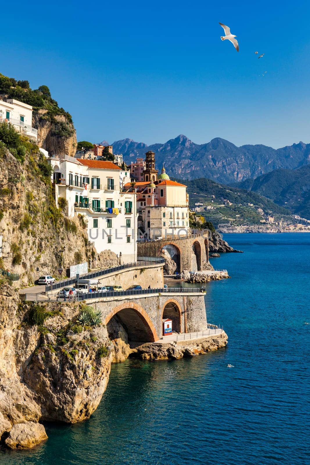 View of Atrani famous coastal village located on Amalfi Coast, Italy. Small town Atrani on Amalfi Coast in province of Salerno, Campania region, Italy. Atrani town on Amalfi coast, Italy.