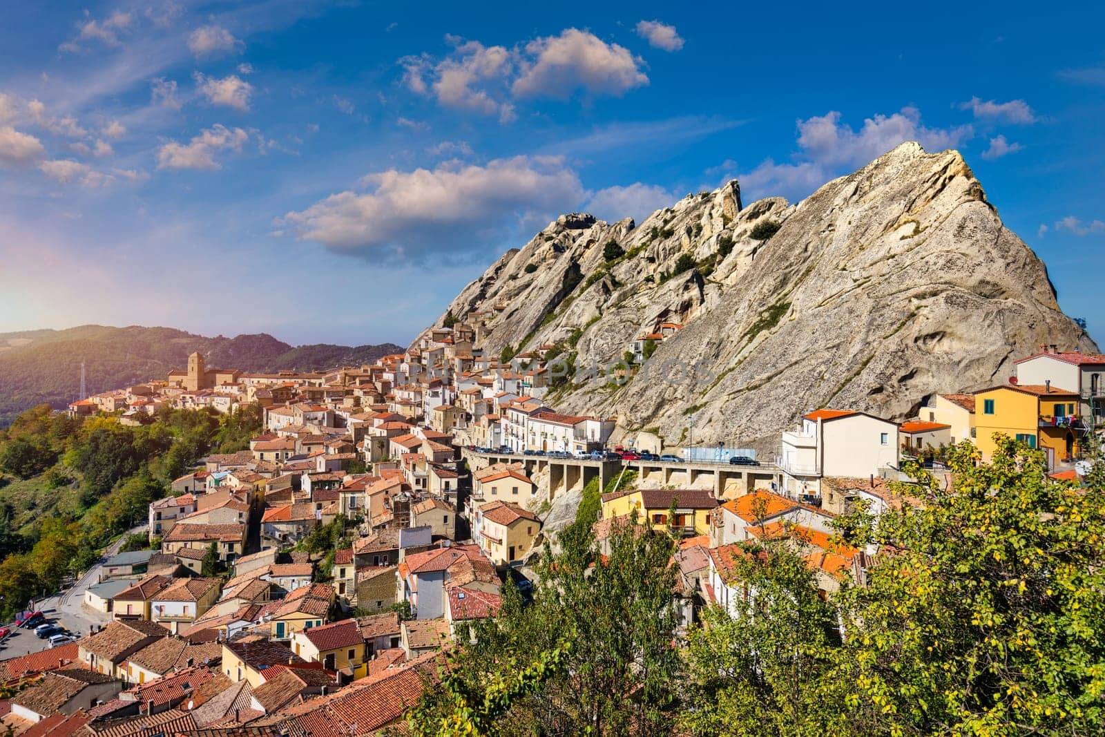 Cityscape aerial view of medieval city of Pietrapertosa, Italy. View of Pietrapertosa town in the Lucanian Dolomites in Italy. Pietrapertosa village in Apennines Dolomiti Lucane. Basilicata, Italy. by DaLiu