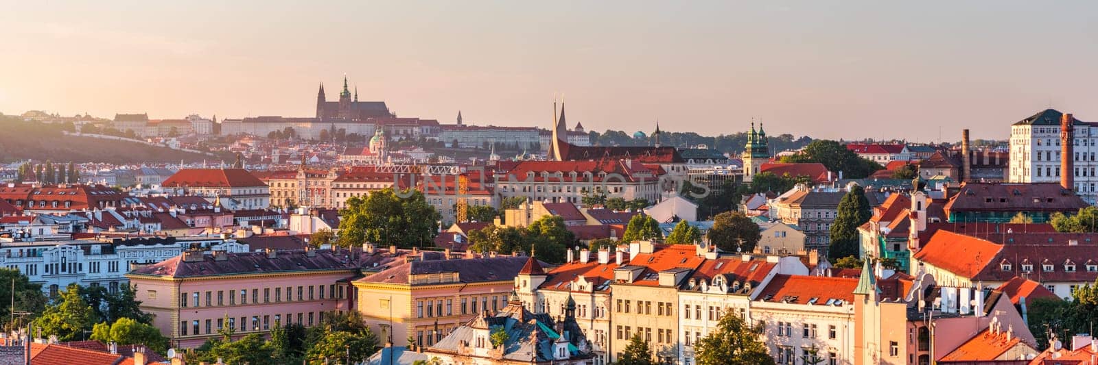 Prague in a sunny day, view of the old town, Prague, Czech Republic. Scenic summer view of the Old Town pier architecture and Charles Bridge over Vltava river in Prague, Czech Republic