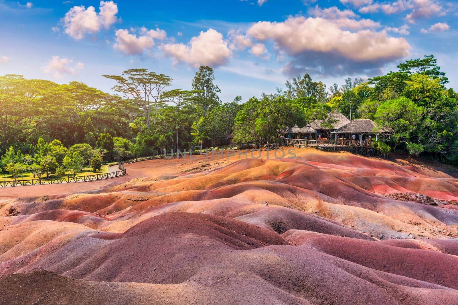 Chamarel Seven Colored Earth Geopark in Mauritius Island. Colorful panoramic landscape about this volcanic geological formation Chamarel Seven Colored Earth Geopark in Riviere noire district.