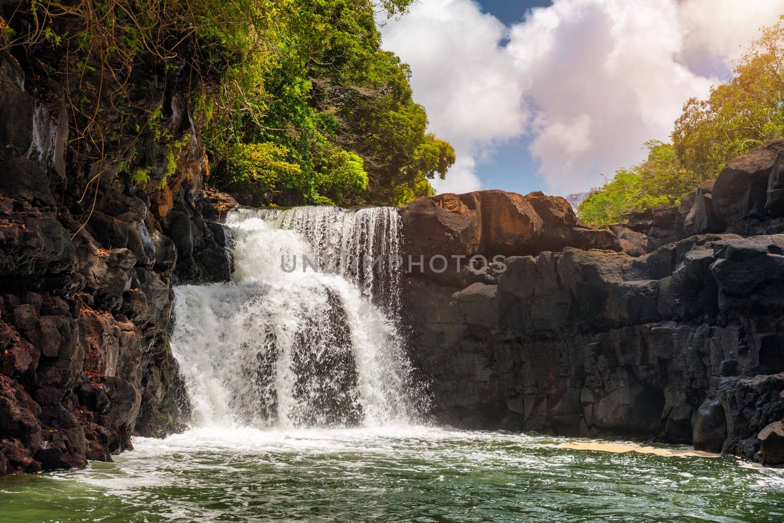 GRSE Waterfall in the jungle of Mauritius island. GRSE Waterfall view on the Grand River on paradise Island of Mauritius.