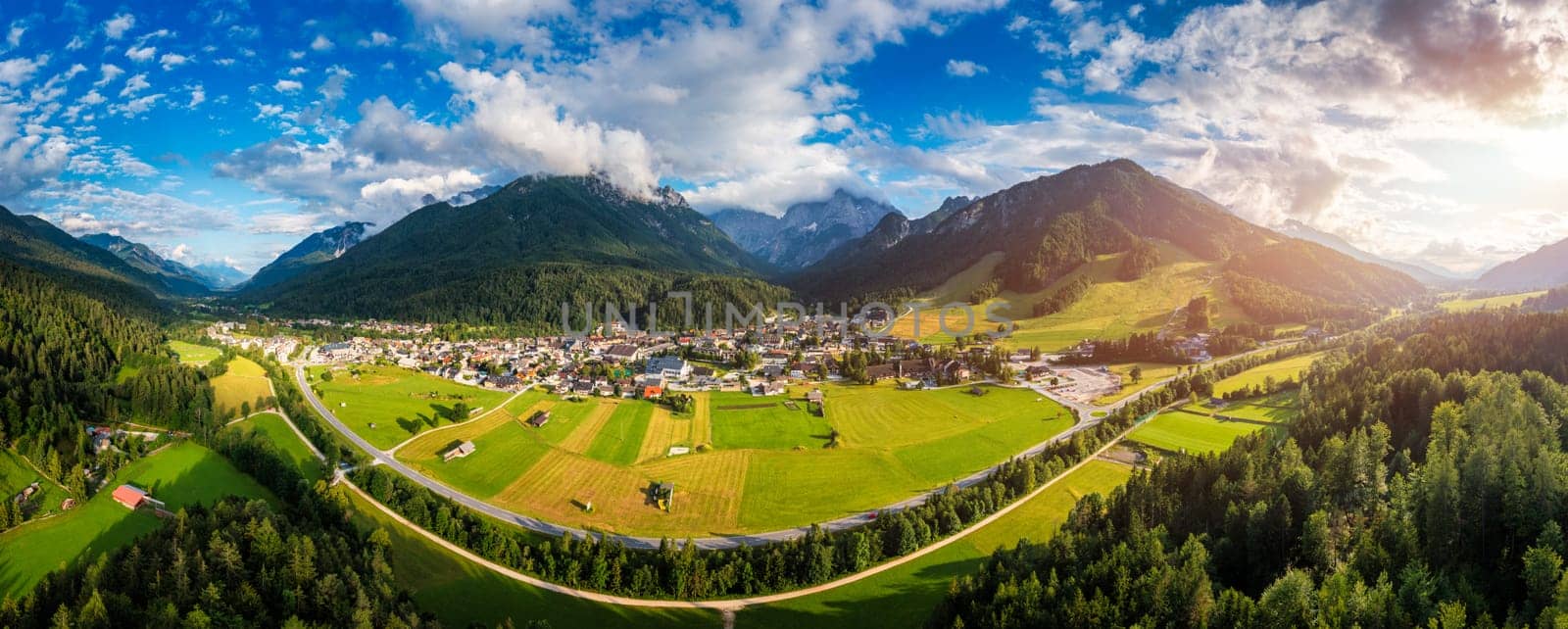 Kranjska Gora town in Slovenia at summer with beautiful nature and mountains in the background. View of mountain landscape next to Kranjska Gora in Slovenia, view from the top the town Kranjska Gora.