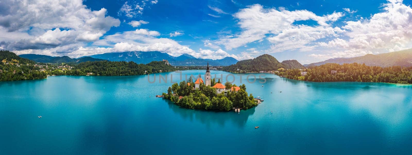 Lake Bled in Slovenia. Beautiful mountains and Bled lake with small Pilgrimage Church. Bled lake and island with Pilgrimage Church of the Assumption of Maria. Bled, Slovenia, Europe.