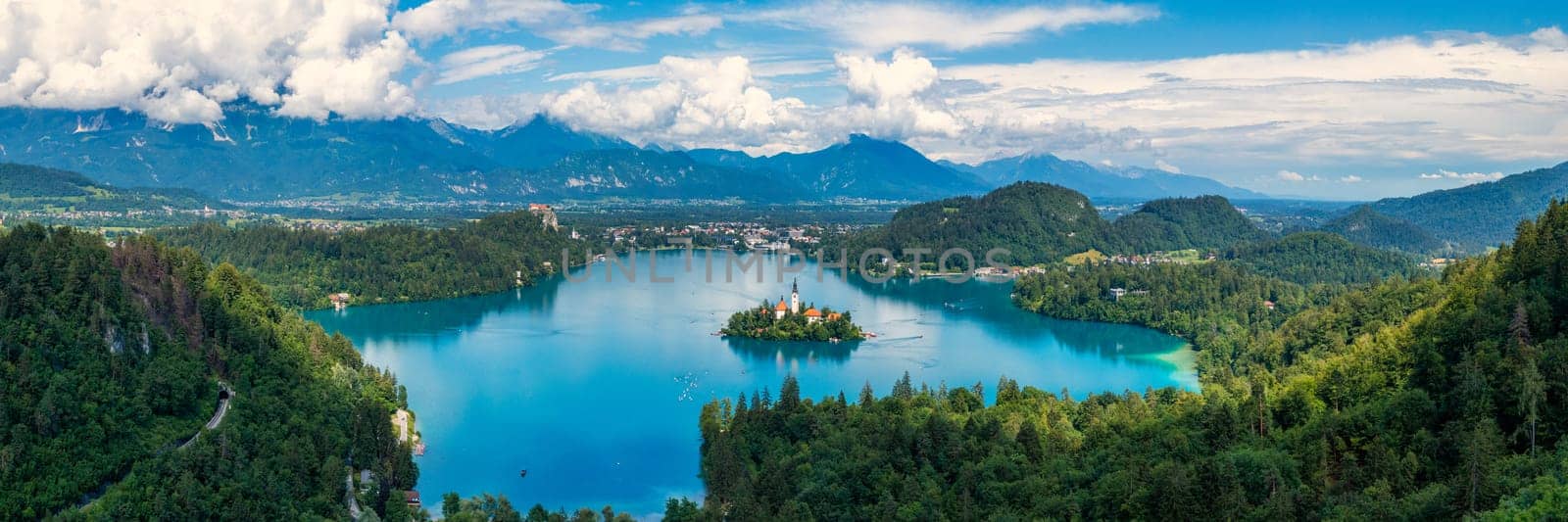 Lake Bled in Slovenia. Beautiful mountains and Bled lake with small Pilgrimage Church. Bled lake and island with Pilgrimage Church of the Assumption of Maria. Bled, Slovenia, Europe.