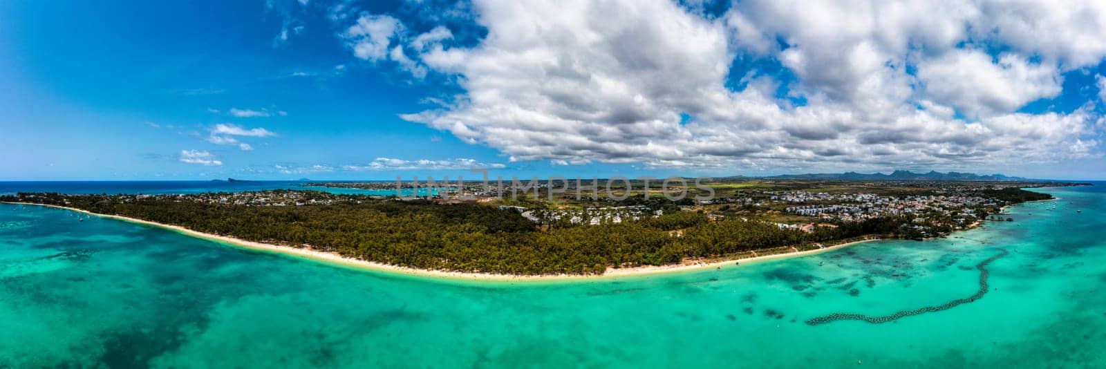 Mauritius beach aerial view of Mont Choisy beach in Grand Baie, Pereybere North. Mont Choisy, public beach in Mauritius island, Africa. Beautiful beach of Mont Choisy in Mauritius, drone aerial view.