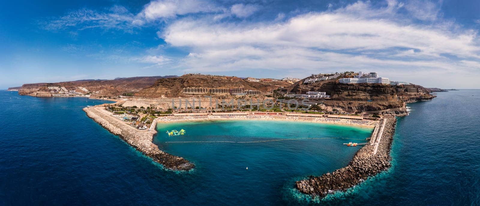 Amadores beach (Spanish: Playa del Amadores) near famous holiday resort Puerto Rico de Gran Canaria on Gran Canaria island, Spain. Playa de Amadores beach near Puerto Rico town, Canary Islands. Spain