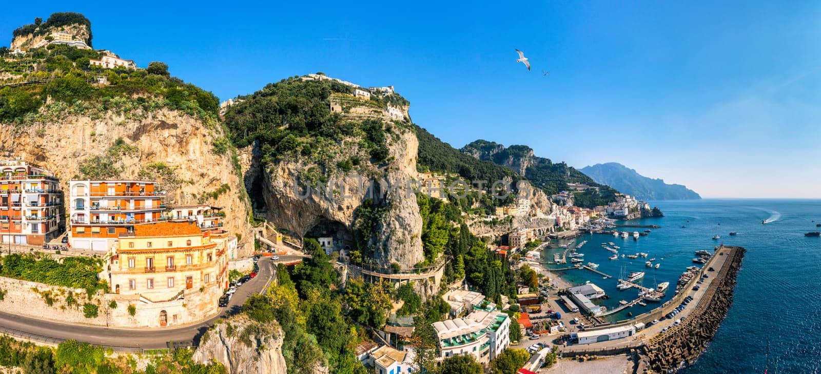 View of beautiful Amalfi town, Campania, Italy. Amalfi coast is most popular travel and holiday destination in Europe. Amalfi cityscape on coast line of mediterranean sea, Amalfi coast, Italy.