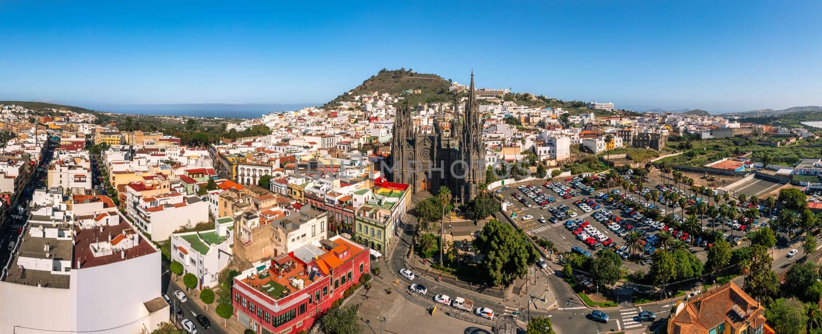 Aerial view of the Parroquia de San Juan Bautista de Arucas church in Arucas town, Gran Canaria, Canary Islands, Spain. Historic Neo-Gothic cathedral in Arucas. 