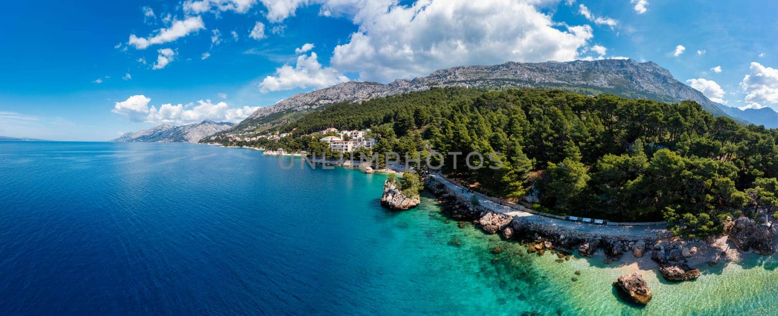 Kamen Brela symbol of the city of Brela on Adriatic coast of Dalmatia, Croatia. Kamen Brela, tiny famous island in Brela, Makarska Riviera, Dalmatia, Croatia.