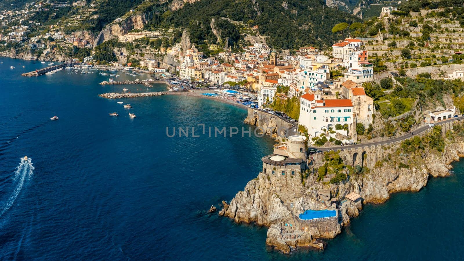 View of beautiful Amalfi town, Campania, Italy. Amalfi coast is most popular travel and holiday destination in Europe. Amalfi cityscape on coast line of mediterranean sea, Amalfi coast, Italy.