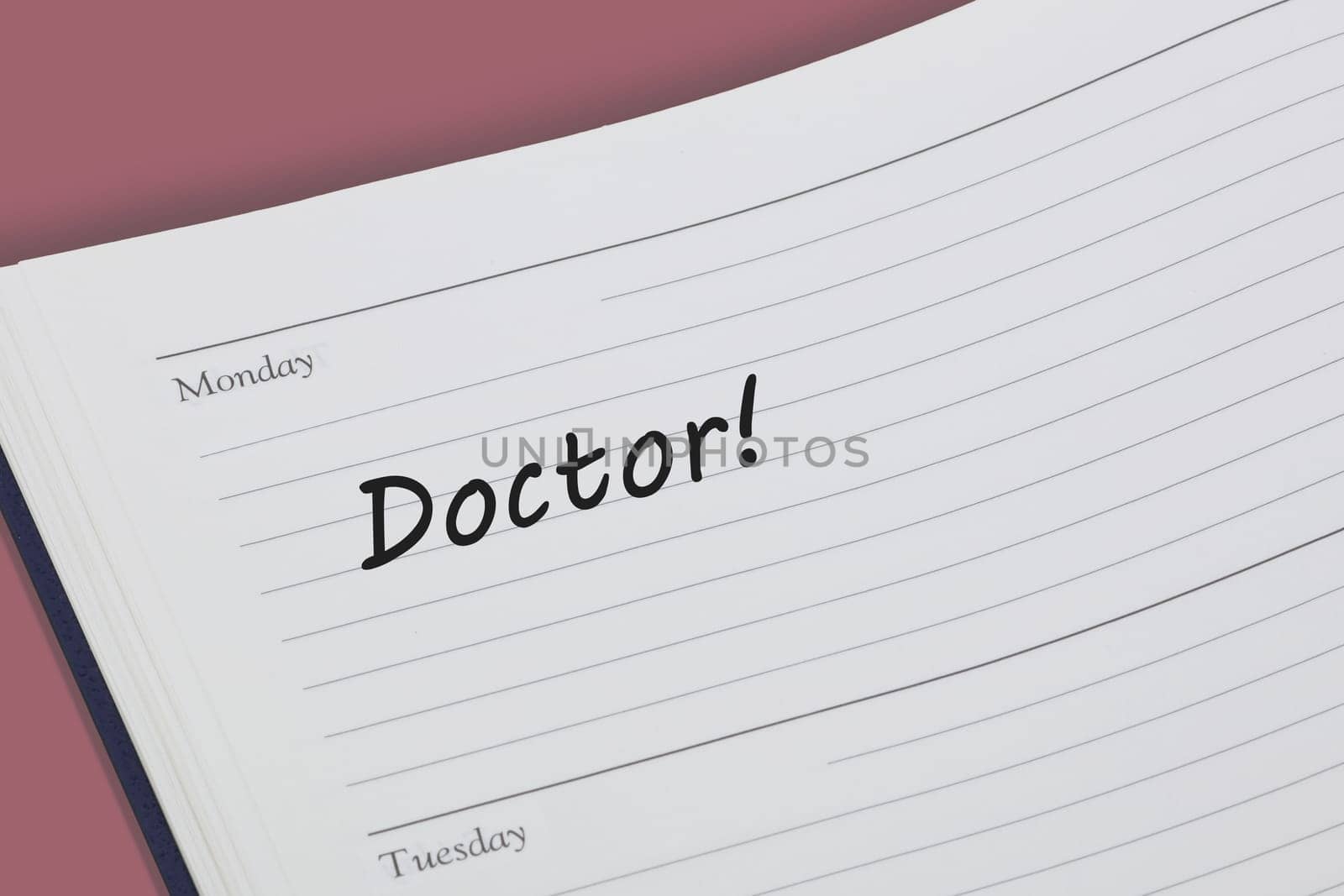 A Doctor reminder note in a diary page