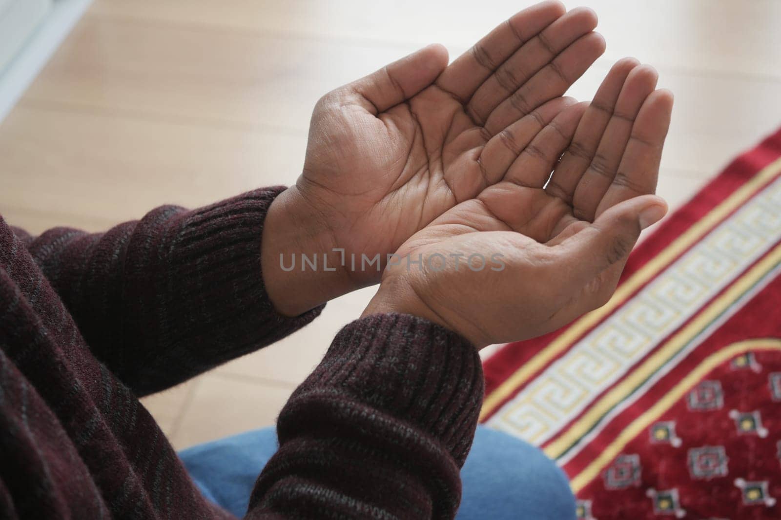 muslim man praying during ramadan .