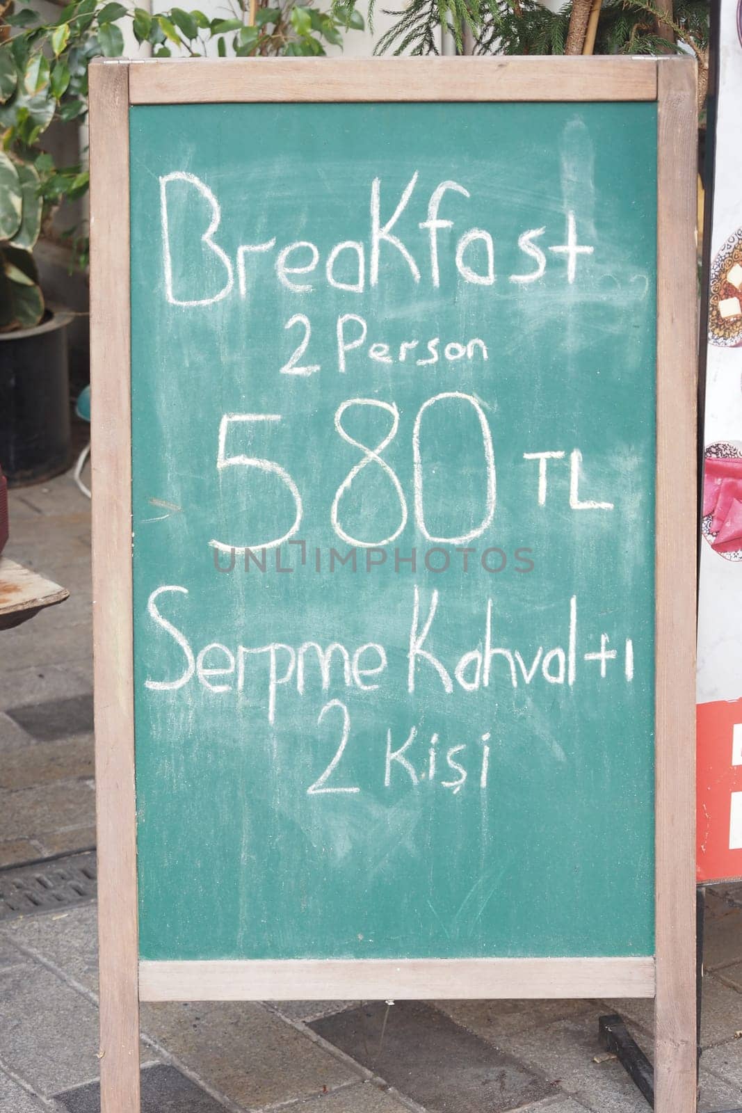 Cafe menu on black board outdoor .