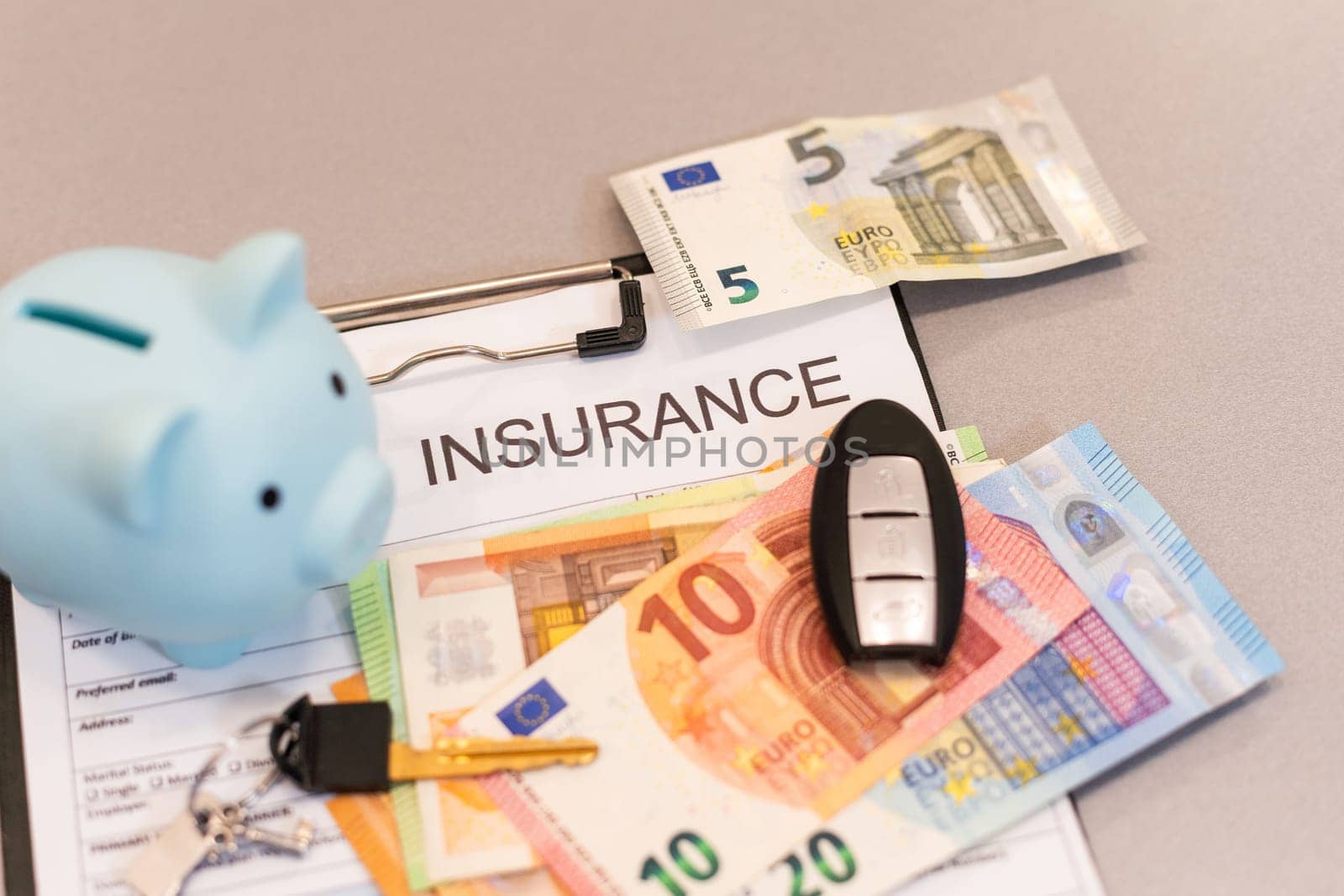 insurance form, folders, piggy bank and money. High quality photo