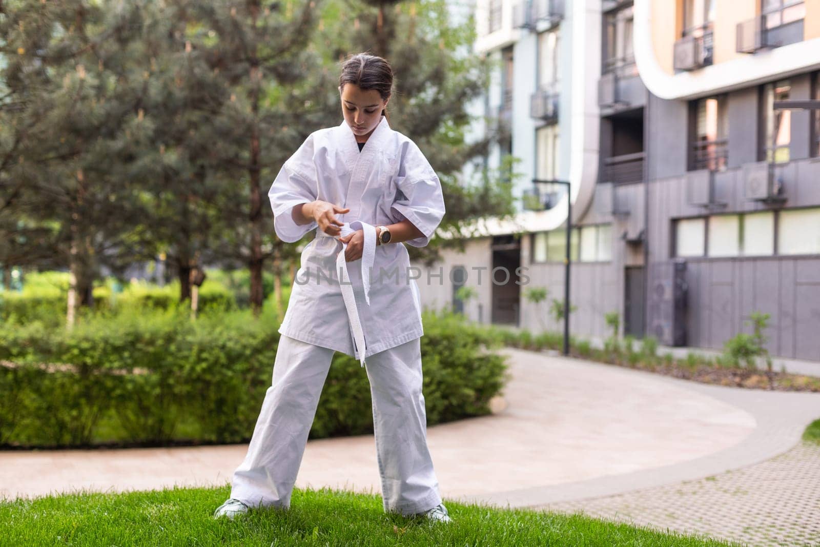 Girl in Karate Taekwondo Fighting Stance. High quality photo