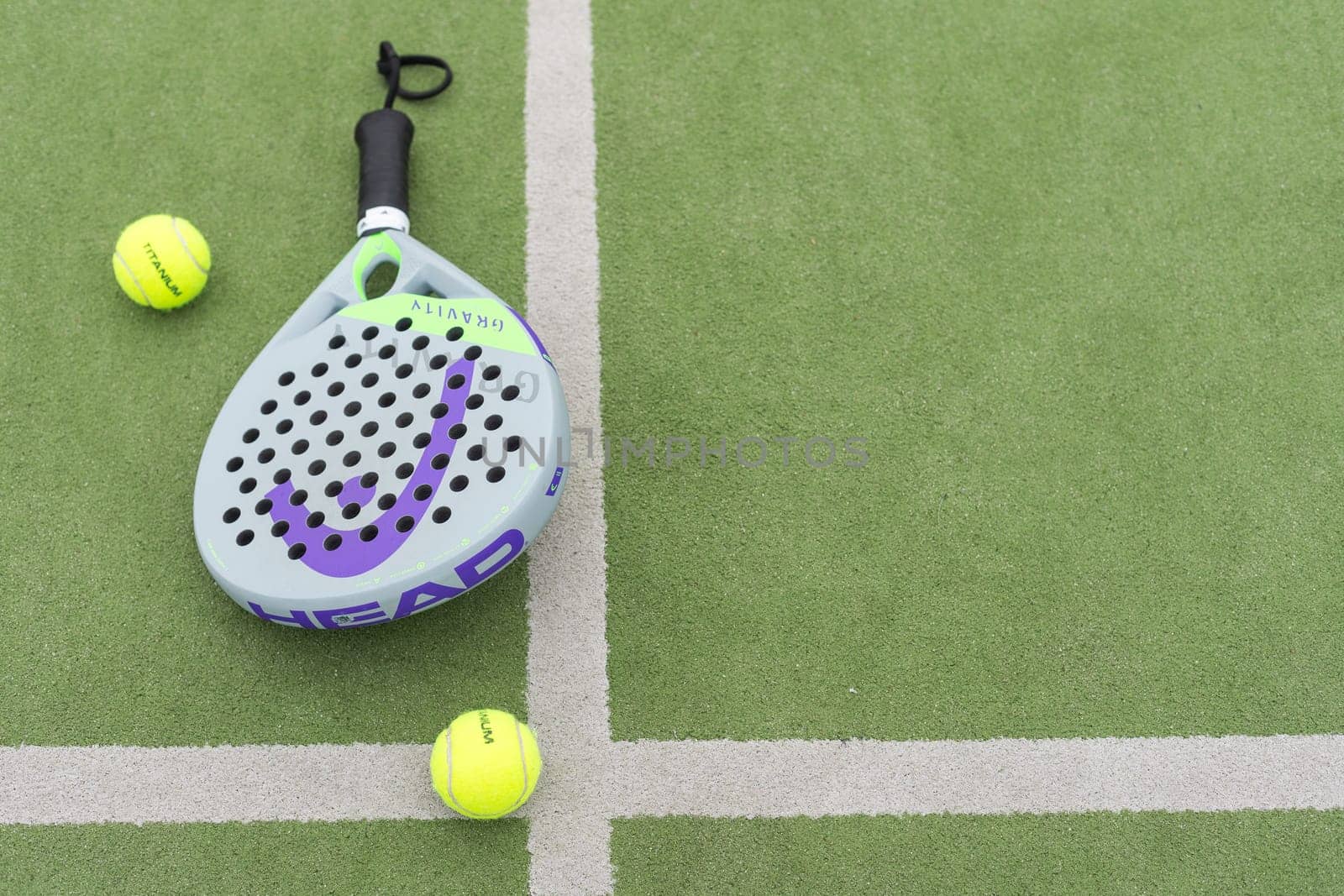 Ukraine Kyiv, April 13 2024. Paddle tennis racket and ball by Andelov13