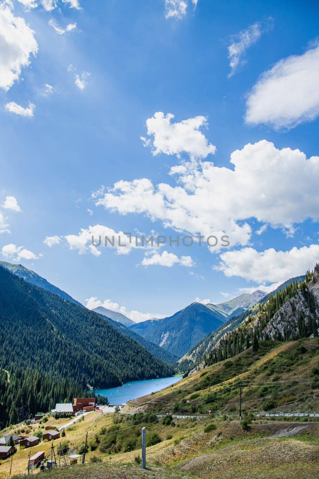 Lower Kolsay mountain lake in the national nature park with blue sky. Near Almaty city in Kazakhstan.