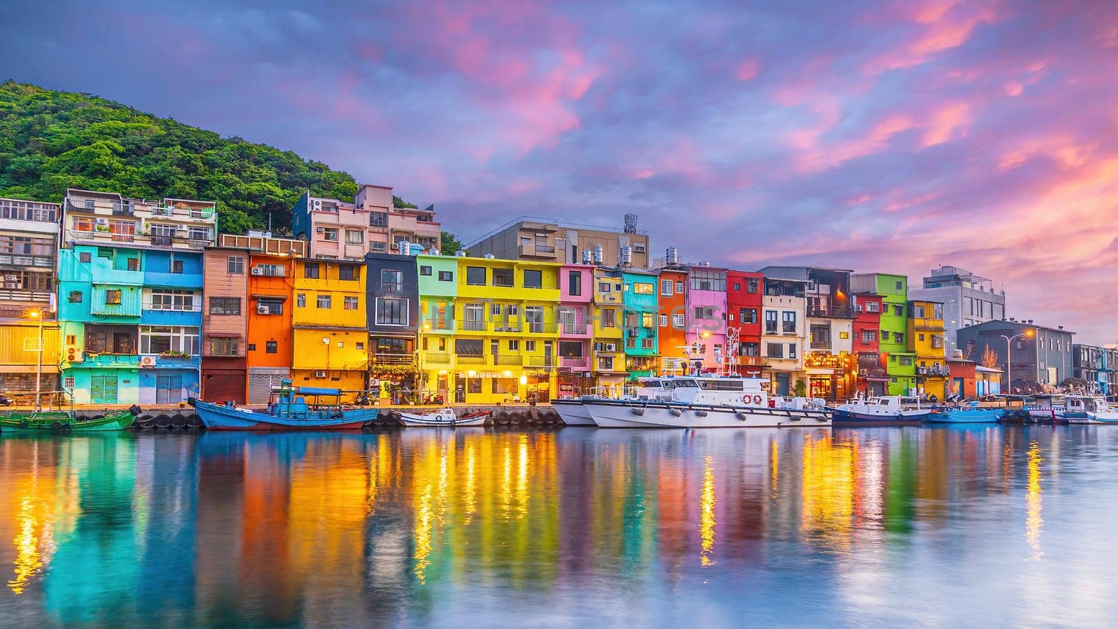 Cityscape of Colorful Zhengbin Fishing Port  in Keelung near Taipei city, Taiwan at sunset