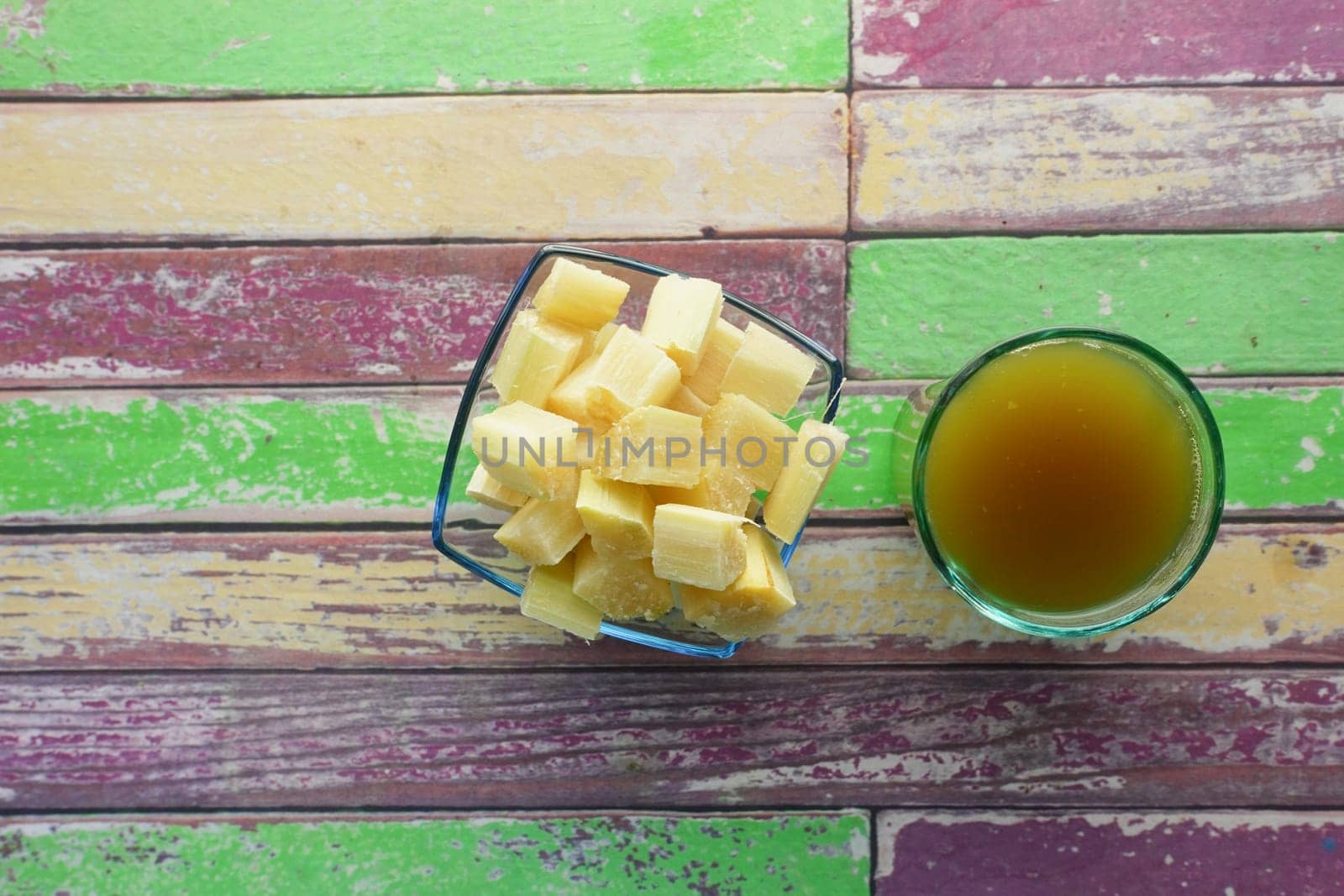 Sugarcane juice on a table .