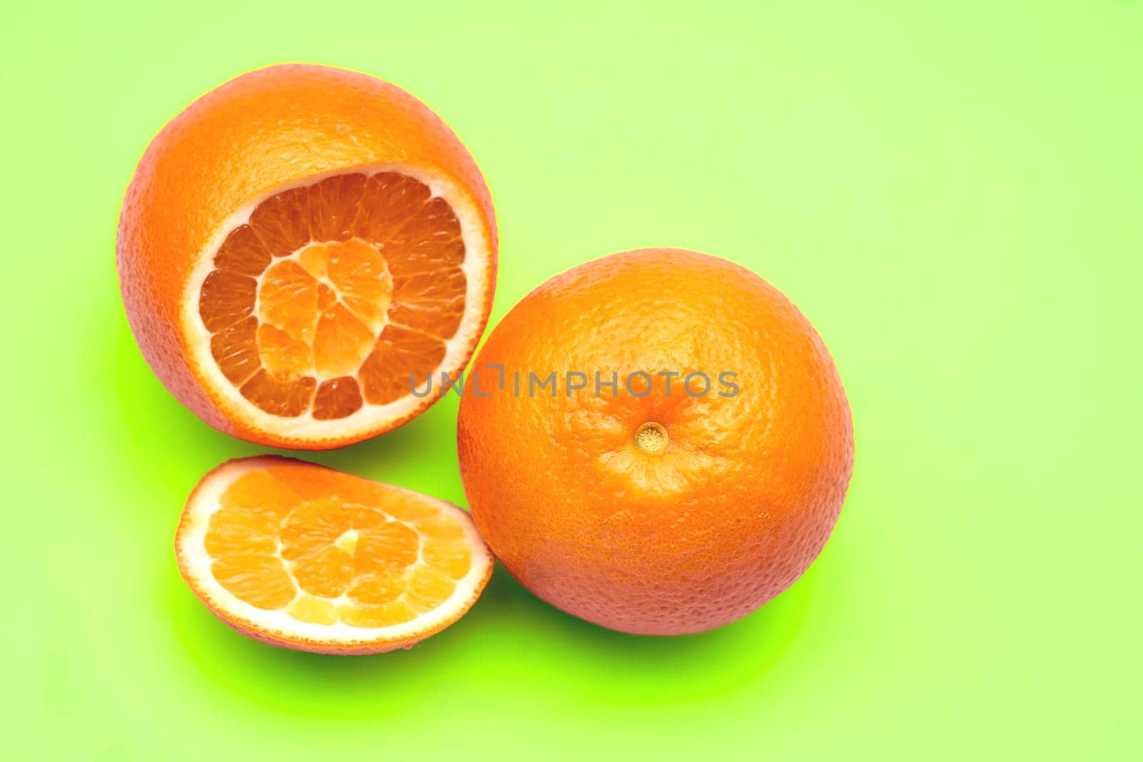 a round juicy citrus fruit with a tough bright reddish yellow rind