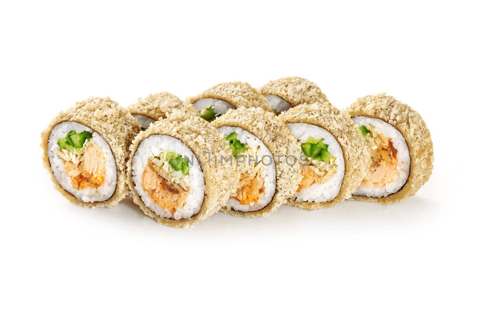 Appetizing crispy tempura rolls with baked salmon, omelette, caramelized onion, napa cabbage and cucumber covered with panko breadcrumbs, isolated on white background. Japanese cuisine
