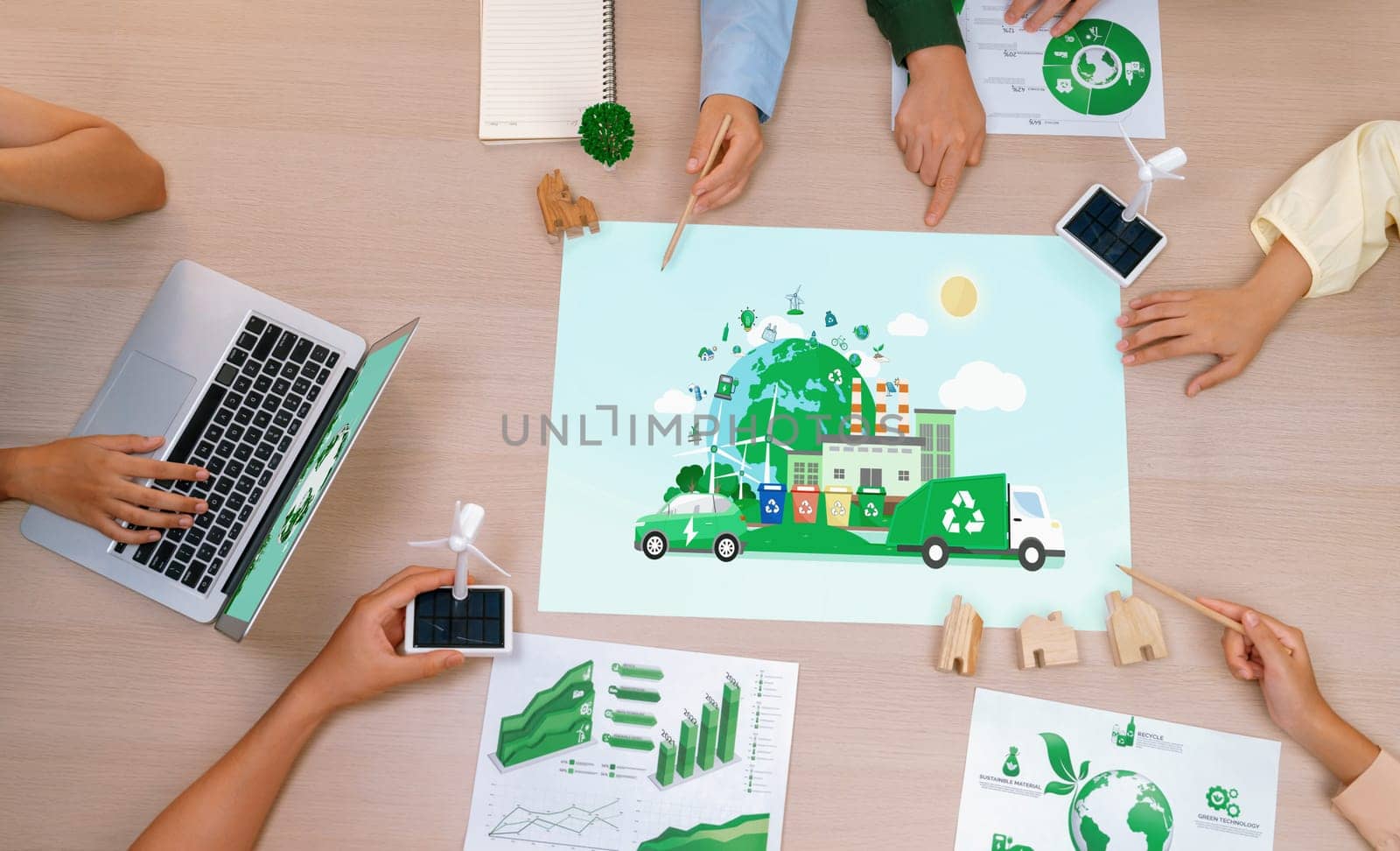 Eco city and waste management illustration placed on a meeting table during a green business meeting discussion. ESG environment social governance and Eco conservative concept. Top view. Delineation.