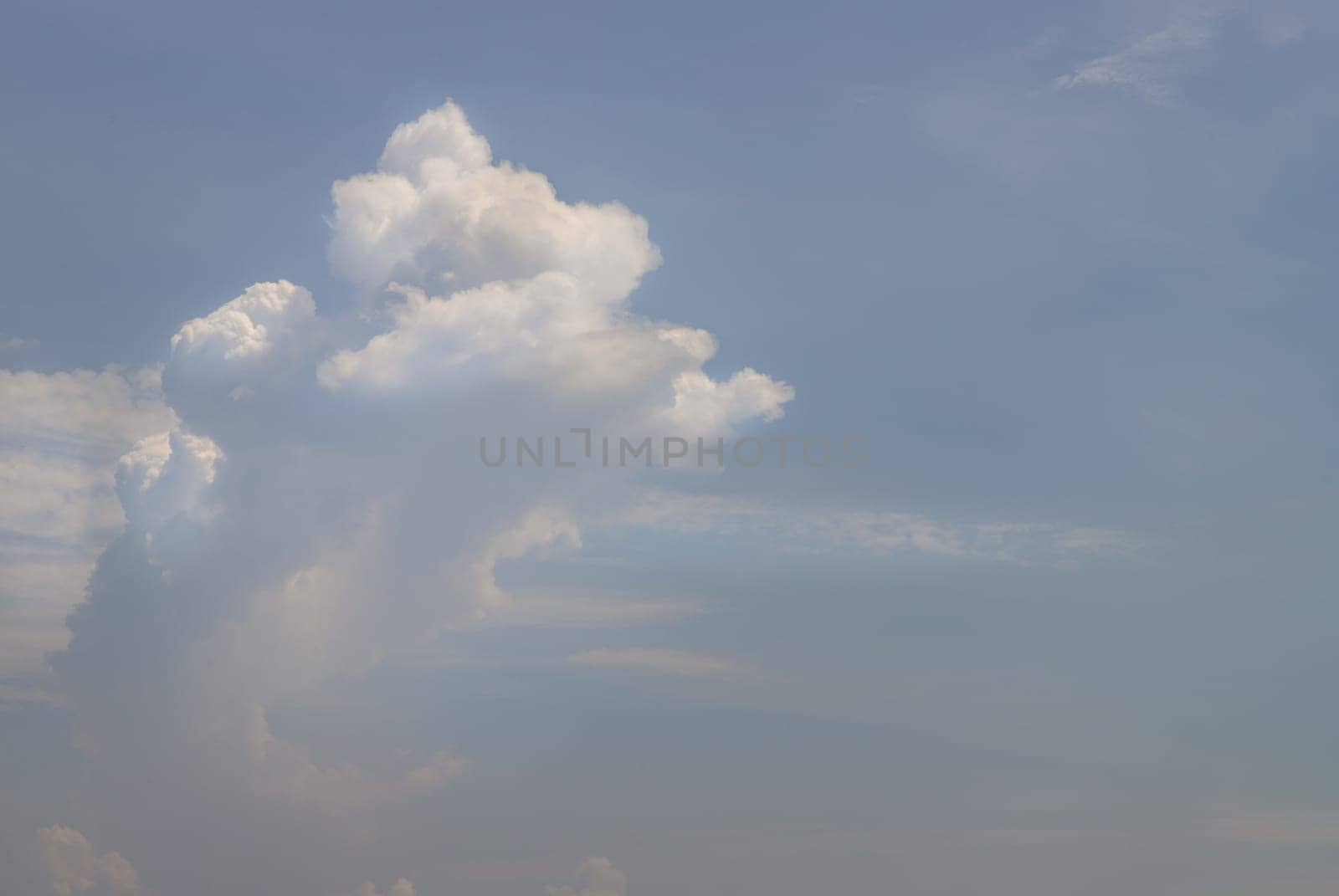 The softness of the white clouds and sky with the light shining from an interesting light pattern against the sky. Skies landscape, Concept idea of Imaginative clouds nature, Cloud cluster can be used for graphics works and resource. Selective focus.