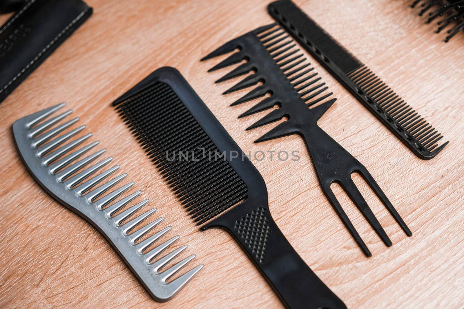 Different combs on the table in the barbershop.