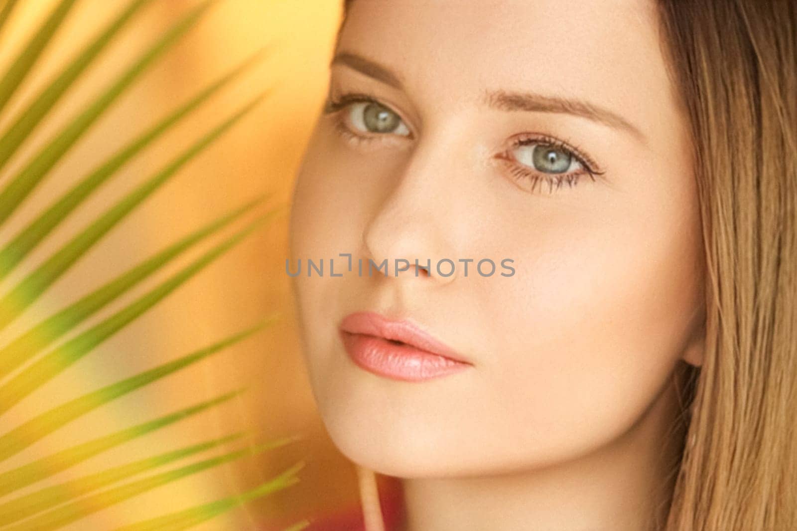 Summer beauty, makeup and skincare, face portrait of beautiful woman with tropical palm tree leaf, natural makeup for cosmetics and fashion look idea