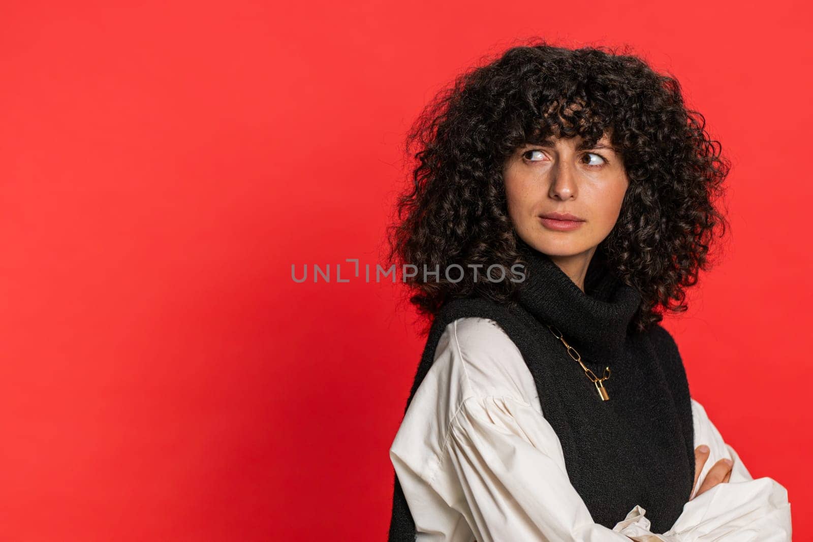 Offended sad nervous Caucasian woman having misunderstanding, frustrated after quarrel, fail, lose, ignores and does not want to communicate, talk. Girl isolated on red background. People lifestyle