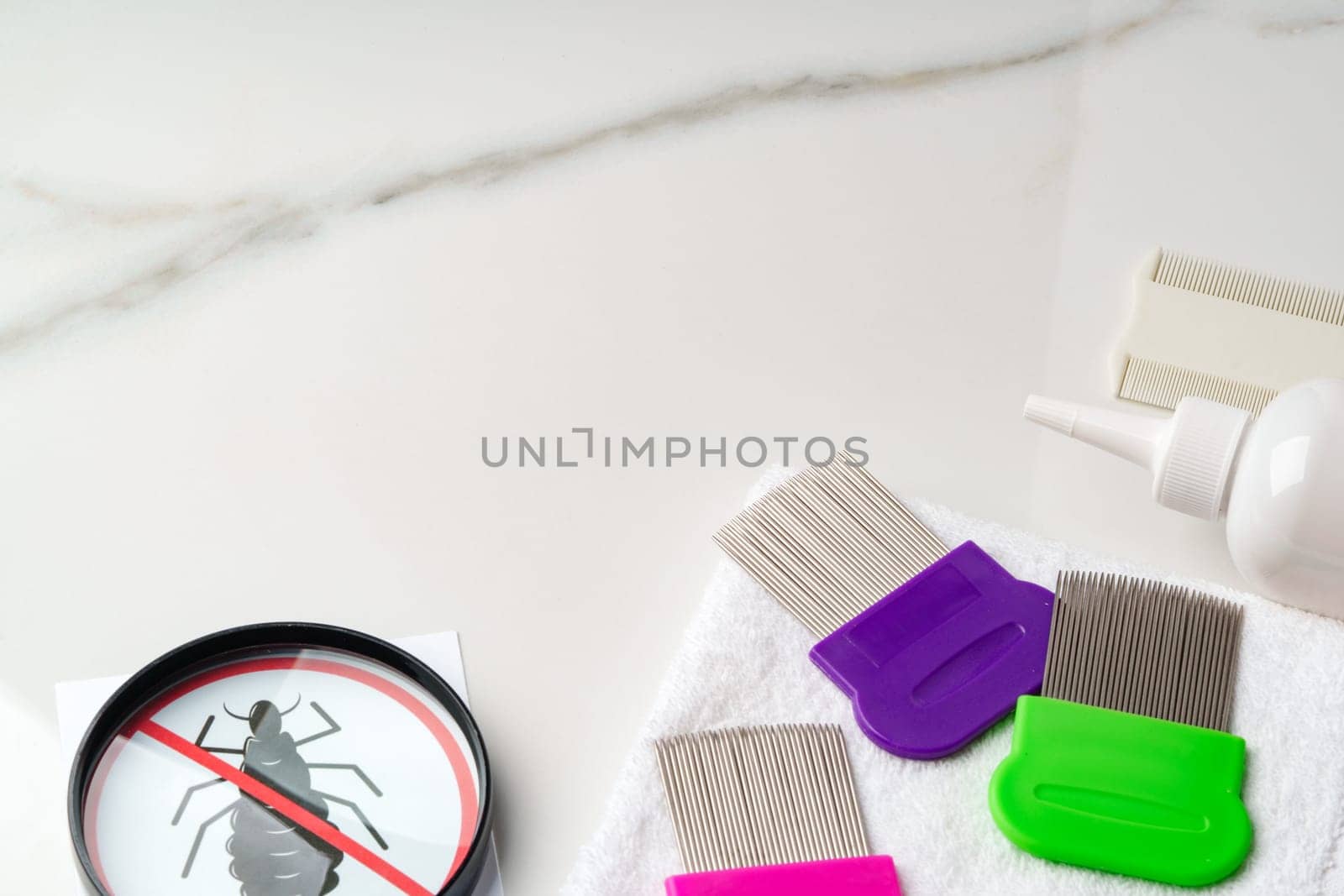 Comb, anti lice medicine and towel on white background by Fabrikasimf